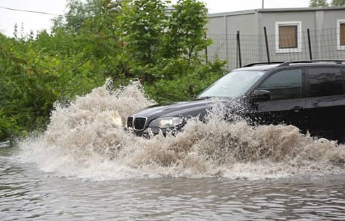 How to Safely Drive Your Car Through Deep Waterlogged Roads